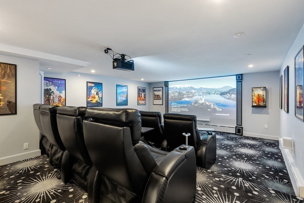 55 Scotch Pine Road Weston, MA 02493 - Photo 30 of 39 a living room with furniture and large windows
