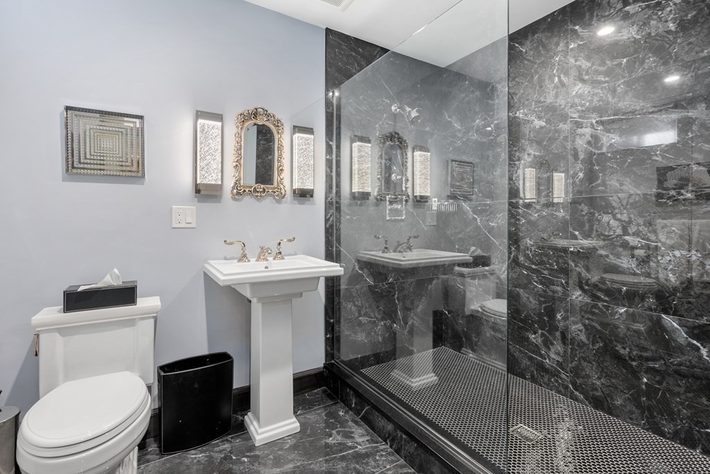55 Scotch Pine Road Weston, MA 02493 - Photo 32 of 39 a bathroom with a sink toilet and shower