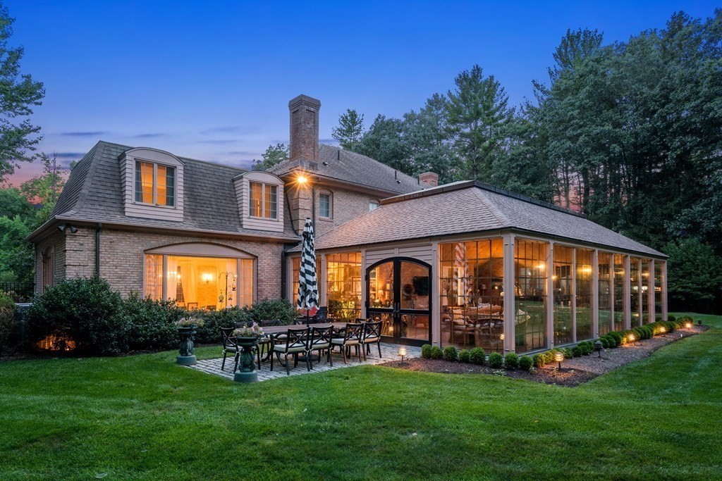 55 Scotch Pine Road Weston, MA 02493 - Photo 35 of 39 a front view of a house with garden