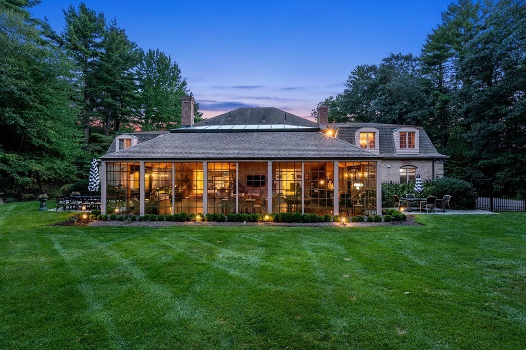 55 Scotch Pine Road Weston, MA 02493 - Photo 38 of 39 a view of a building with a big yard and large trees