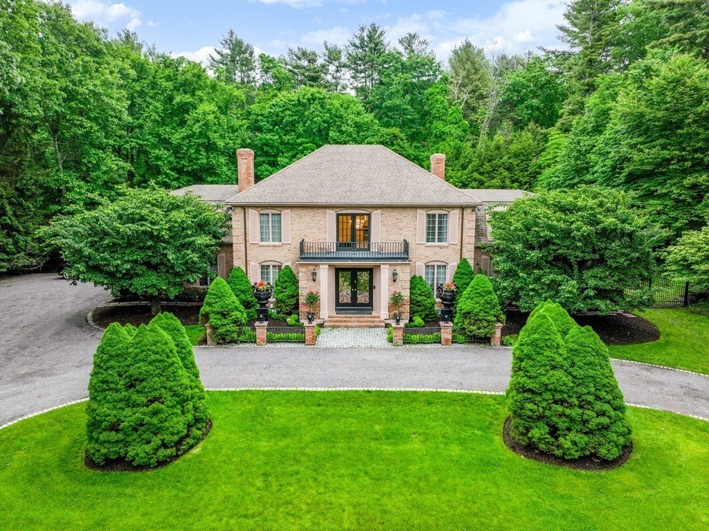 55 Scotch Pine Road Weston, MA 02493 - Photo 39 of 39 a view of a house with a yard and potted plants