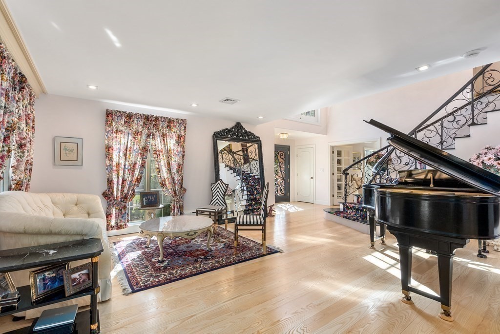 55 Scotch Pine Road Weston, MA 02493 - Photo 5 of 39 a living room with furniture and wooden floor