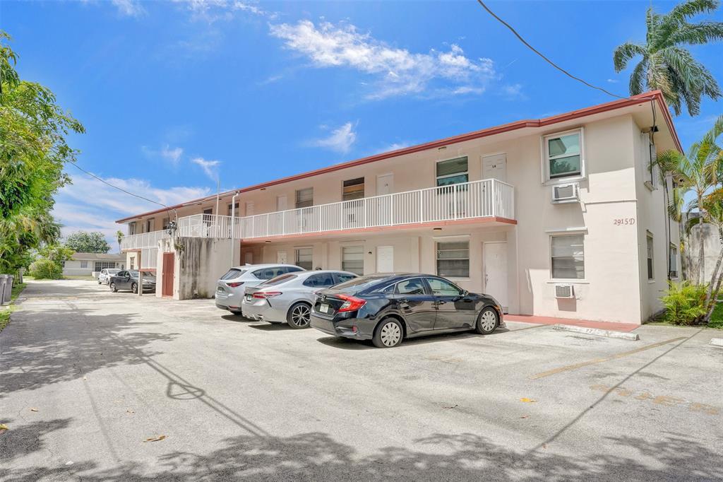 2915 Plunkett Street, Unit 5D Hollywood, FL 33020 - Photo 2 of 11 a car parked in front of a building