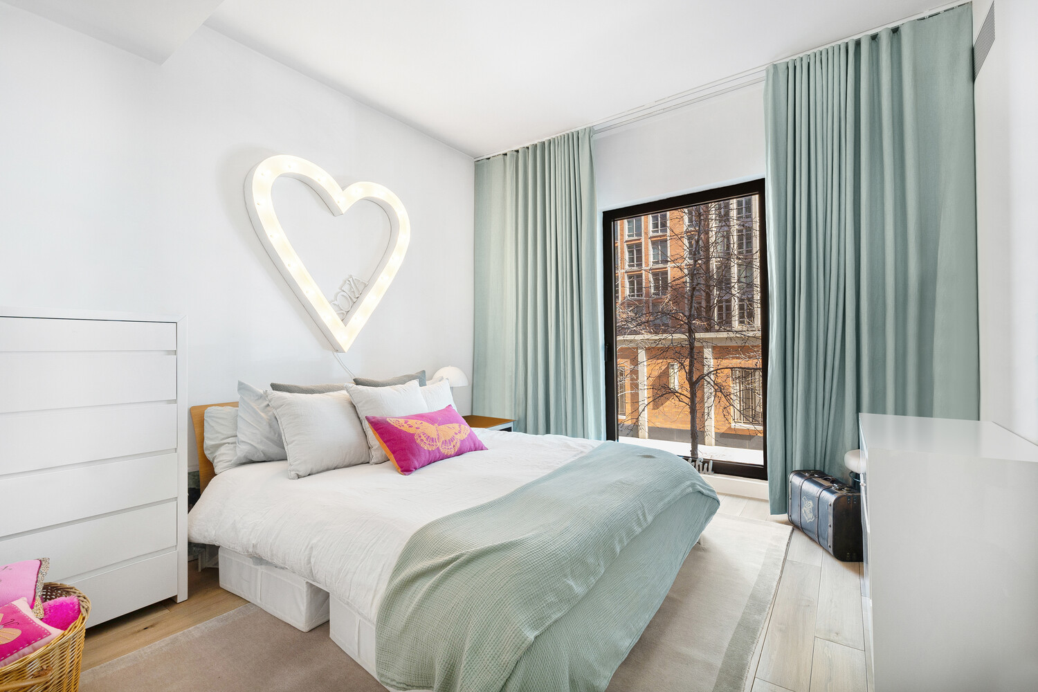 15 Renwick Street, Unit TH3 Manhattan, NY 10013 - Photo 17 of 28 a bedroom with a bed and a large window