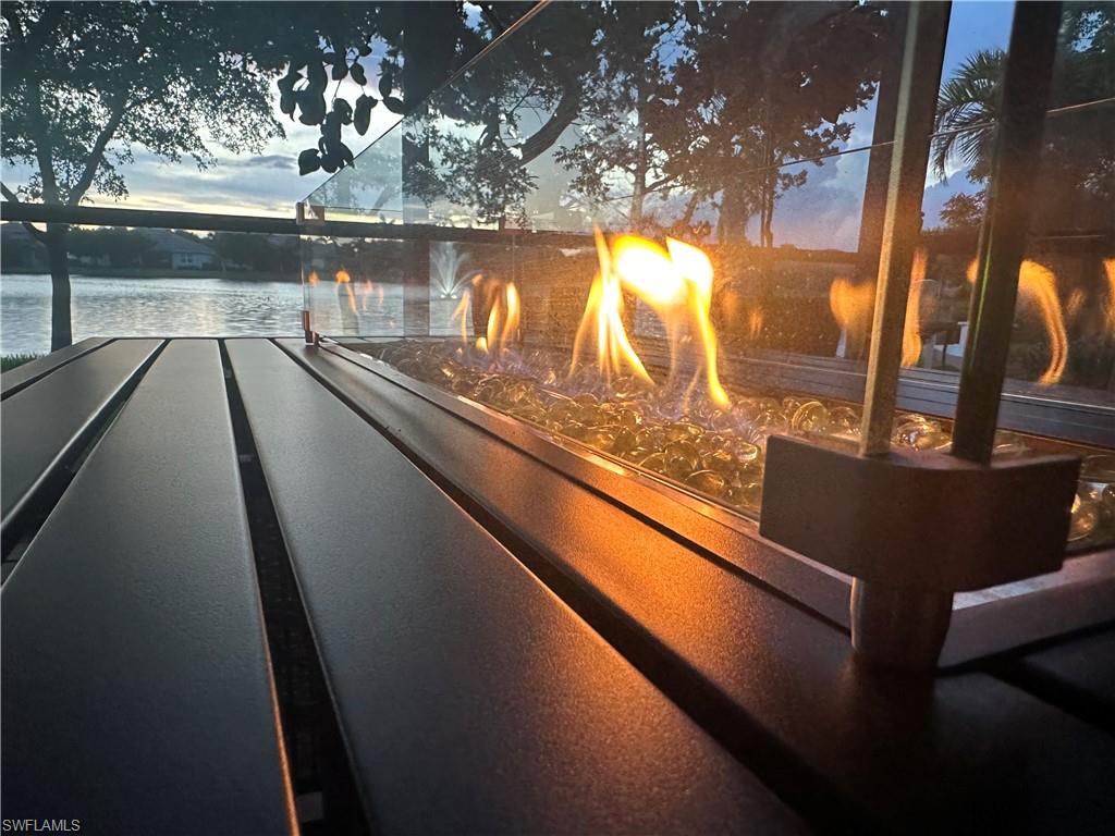 14672 Edgewater Circle Naples, FL 34114 - Photo 25 of 41 a view of swimming pool from a balcony