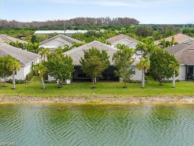 a view of a town with mountains in the background
