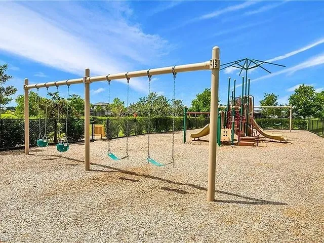 a view of a park with a slide