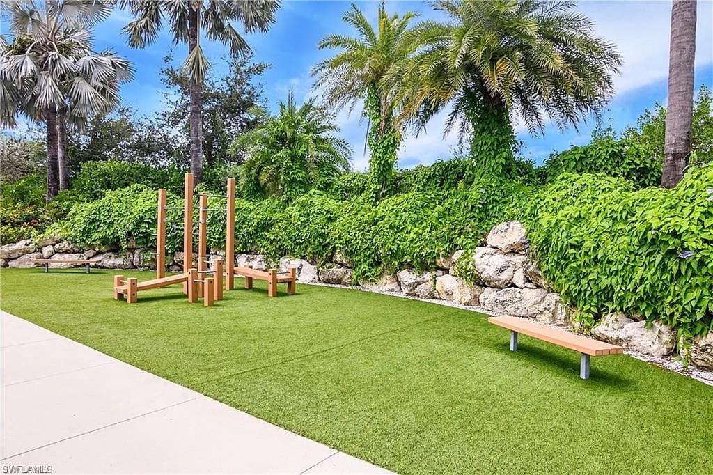 14672 Edgewater Circle Naples, FL 34114 - Photo 34 of 41 a view of a park with palm trees