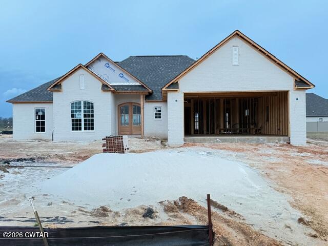 a front view of a house with a porch
