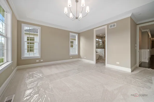a bathroom with a toilet and a sink