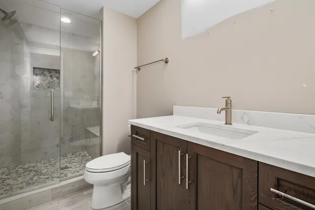 a view of house with backyard and a garden