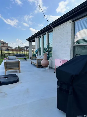 a backyard of a house with seating space