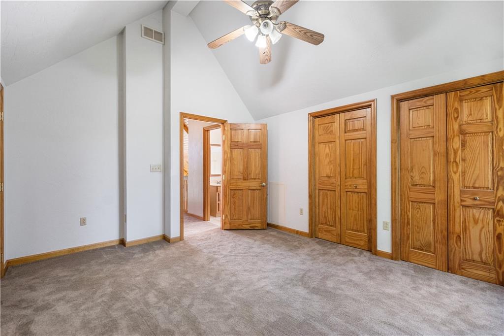 58 Happy Valley Road Perryopolis, PA 15473 - Photo 14 of 25 an empty room with chandelier fan