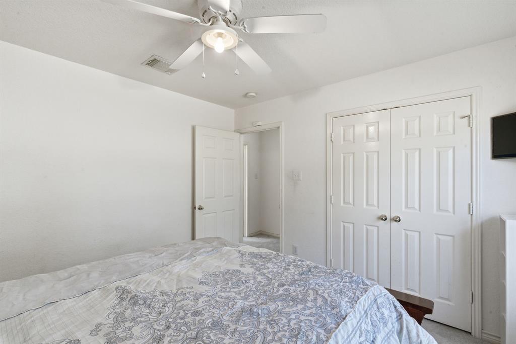 2710 Fairview Road Millsap, TX 76066 - Photo 13 of 40 a view of a livingroom with a chandelier fan