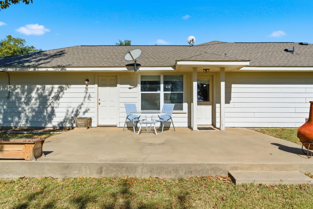 2710 Fairview Road Millsap, TX 76066 - Photo 26 of 40 a view of a patio with swimming pool table and chairs