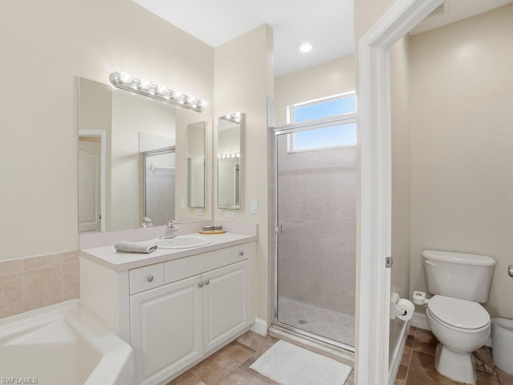12719 Stone Tower Loop Fort Myers, FL 33913 - Photo 24 of 45 a bathroom with a sink toilet and shower