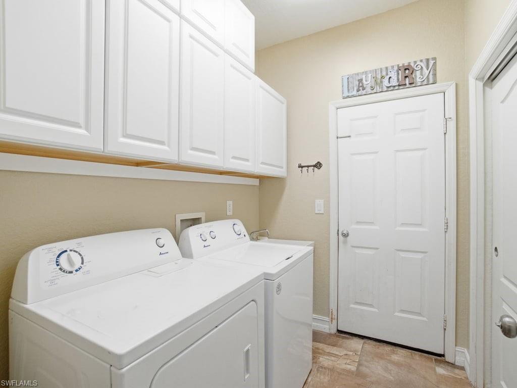 12719 Stone Tower Loop Fort Myers, FL 33913 - Photo 30 of 45 a utility room with dryer and washer