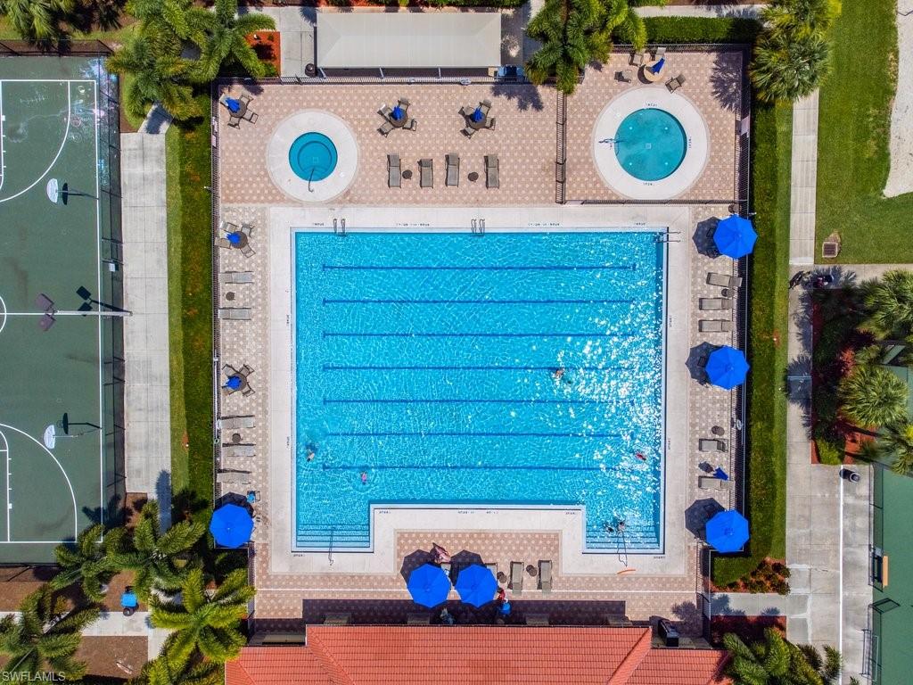 12719 Stone Tower Loop Fort Myers, FL 33913 - Photo 40 of 45 view of living room with washer and flowers