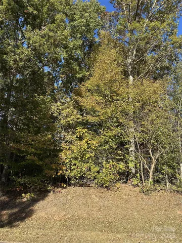 a view of a yard covered with snow