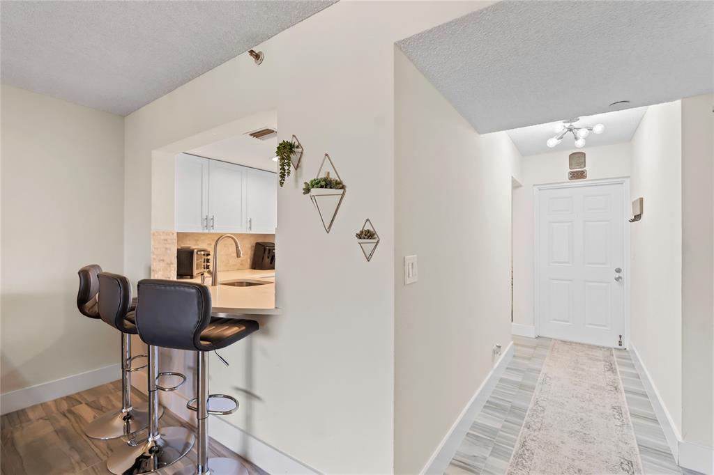 1850 Homewood Boulevard, Unit 512 Delray Beach, FL 33445 - Photo 11 of 43 a view of entryway with livingroom