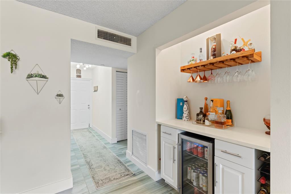 1850 Homewood Boulevard, Unit 512 Delray Beach, FL 33445 - Photo 12 of 43 a room with storage and utility