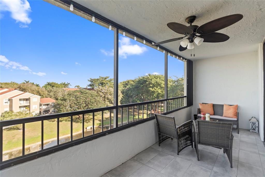 1850 Homewood Boulevard, Unit 512 Delray Beach, FL 33445 - Photo 23 of 43 a view of a balcony with furniture