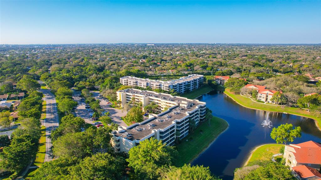 1850 Homewood Boulevard, Unit 512 Delray Beach, FL 33445 - Photo 42 of 43 an aerial view of a house with a swimming pool