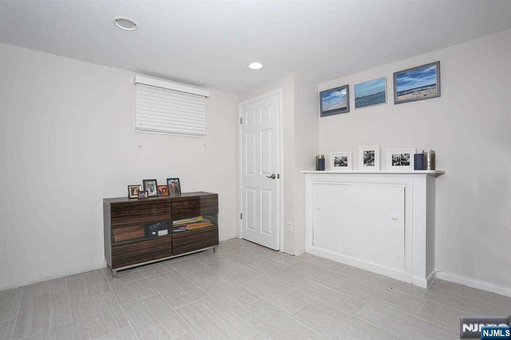 11 Evans Road Cresskill, NJ 07626 - Photo 25 of 31 a room with a bed and a cabinets