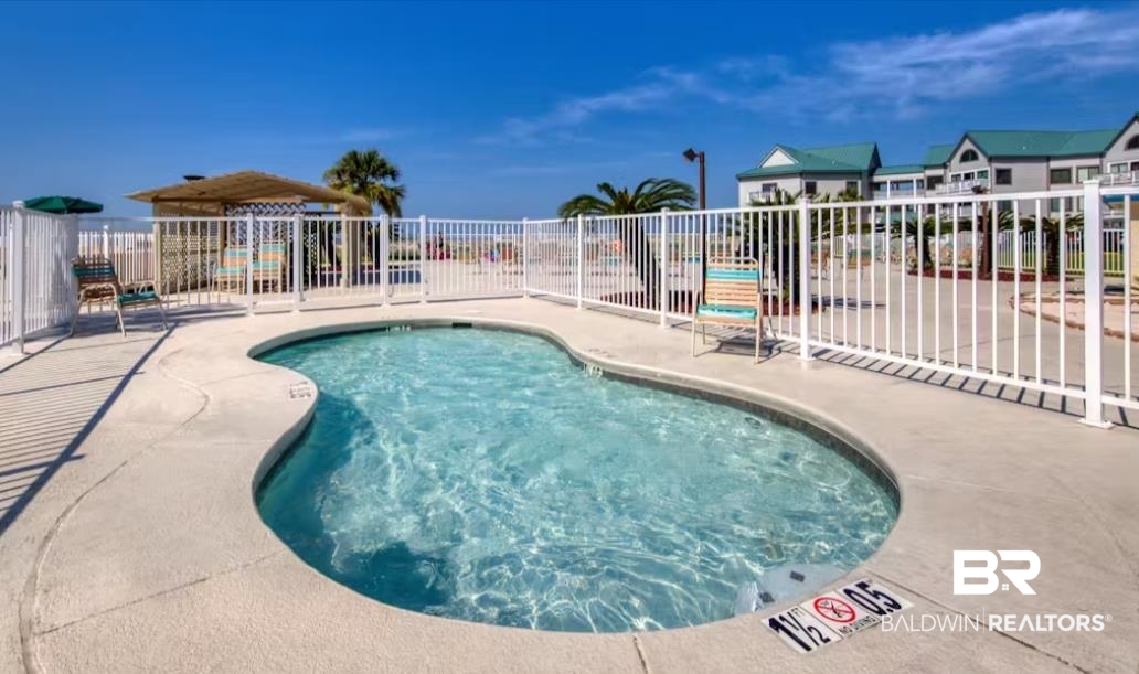 375 Plantation Road, Unit 5814 Gulf Shores, AL 36542 - Photo 18 of 31 View of pool featuring a patio
