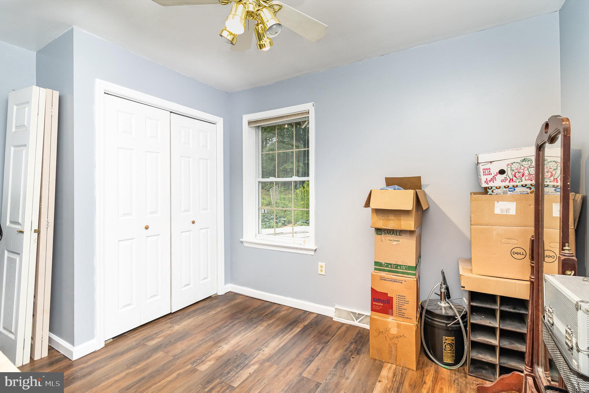 316 House Rock Road Pequea, PA 17565 - Photo 13 of 21 wooden floor in an empty room with a window