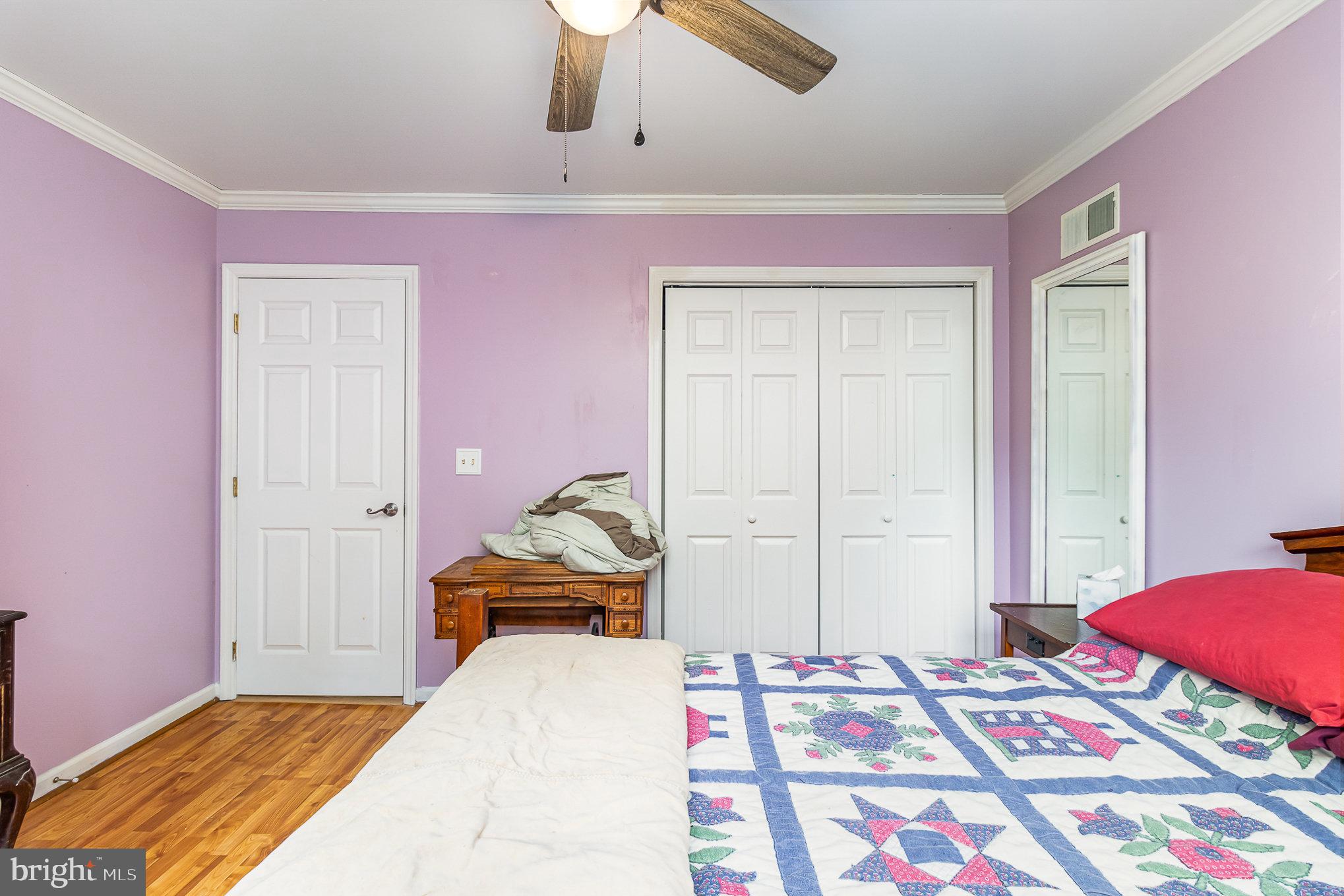 316 House Rock Road Pequea, PA 17565 - Photo 14 of 21 a bed room with a bed and a lamp