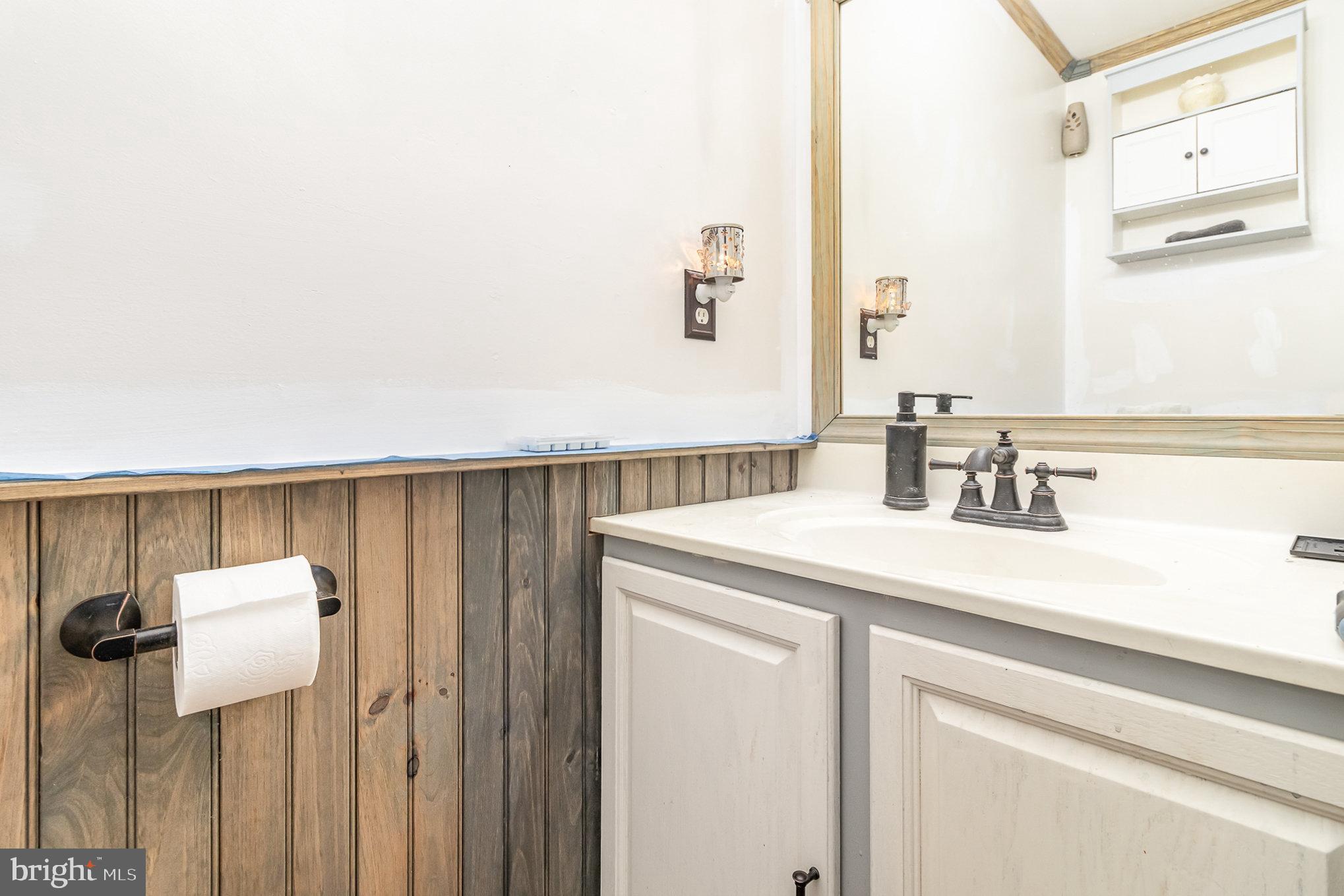 316 House Rock Road Pequea, PA 17565 - Photo 17 of 21 a bathroom with a sink and a mirror
