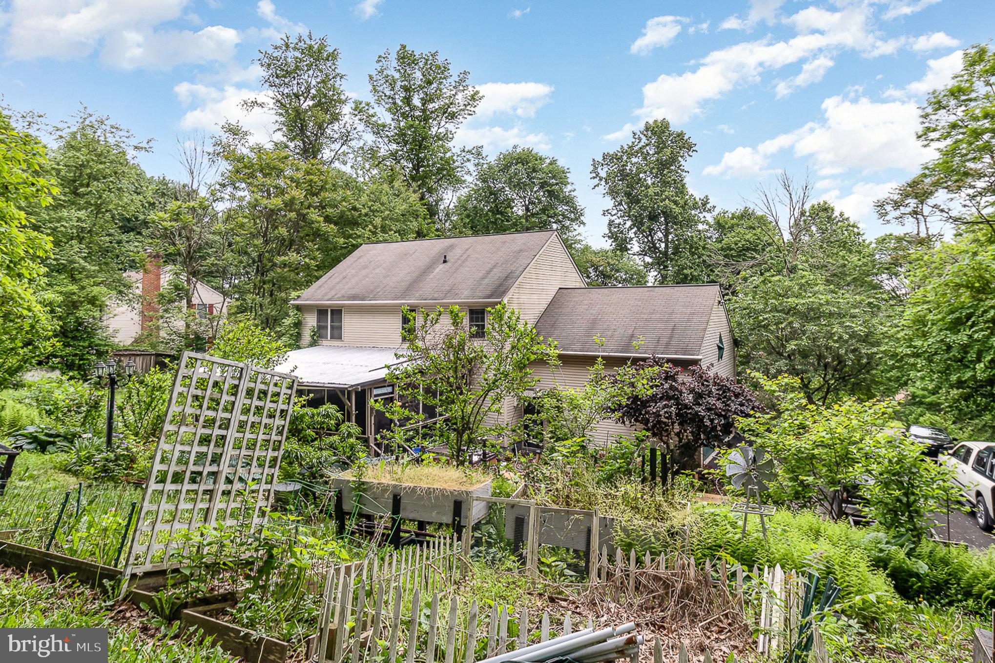 316 House Rock Road Pequea, PA 17565 - Photo 20 of 21 a garden view with a seating space