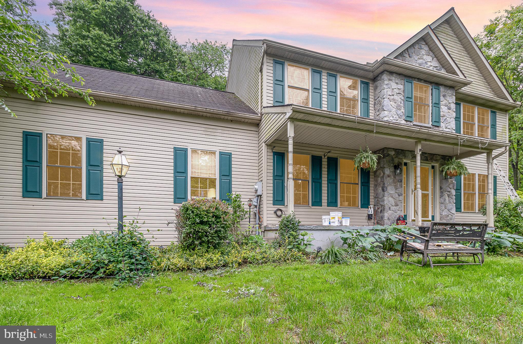 316 House Rock Road Pequea, PA 17565 - Photo 2 of 21 front view of a house with a yard