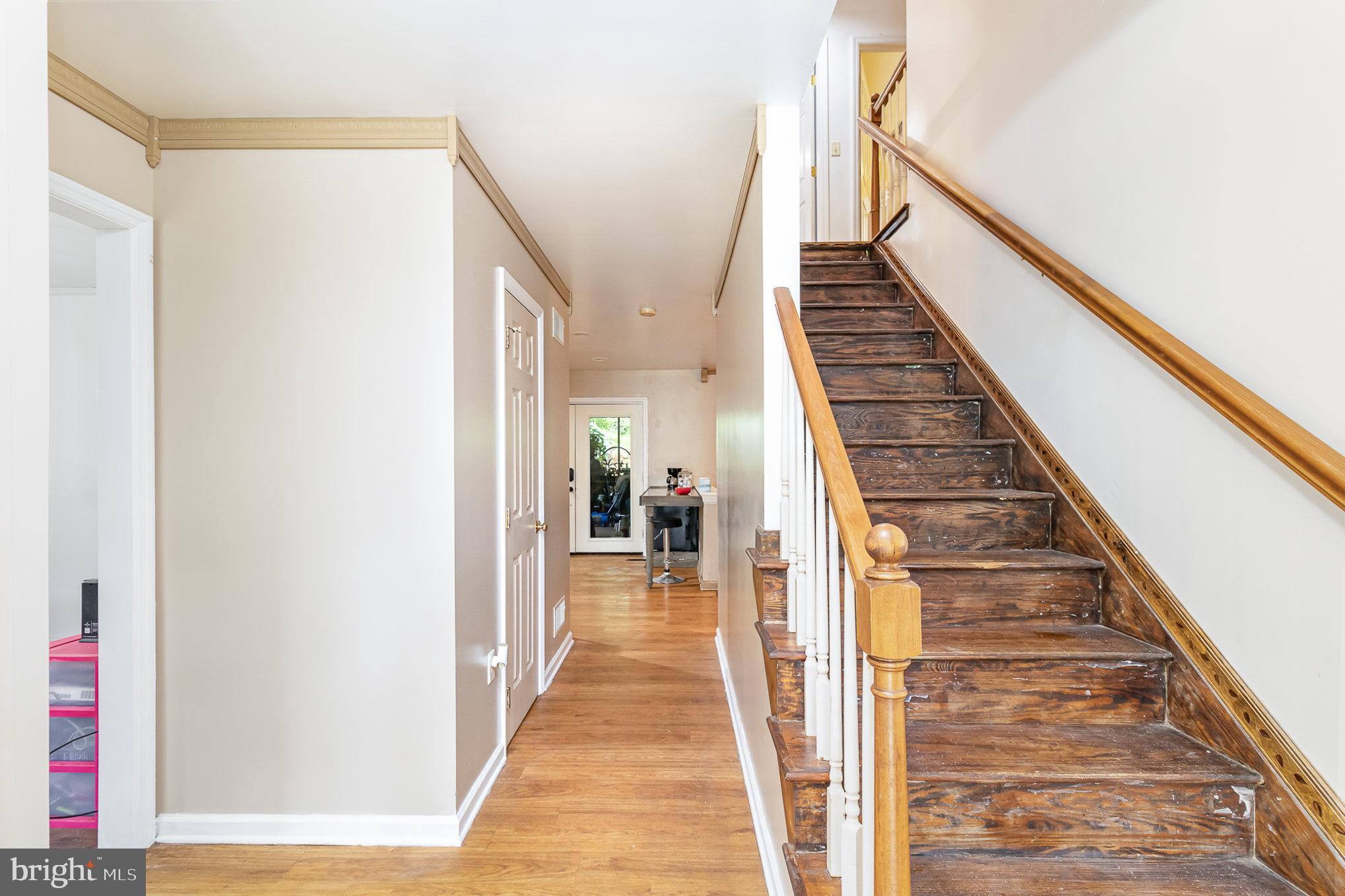 316 House Rock Road Pequea, PA 17565 - Photo 7 of 21 a view of a hallway with wooden floor and staircase