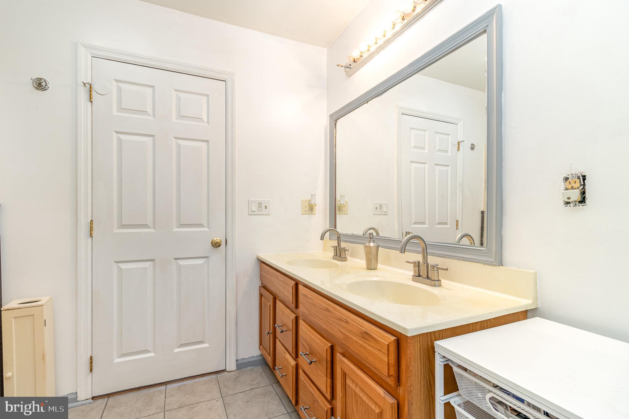 316 House Rock Road Pequea, PA 17565 - Photo 9 of 21 a bathroom with a sink and a mirror
