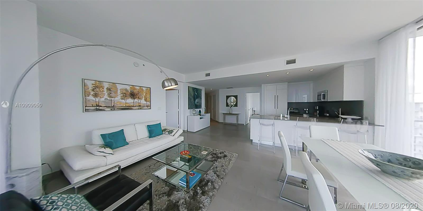 88 Southwest 7th Street, Unit 2911 Miami, FL 33130 - Photo 11 of 25 a living room with furniture and a flat screen tv