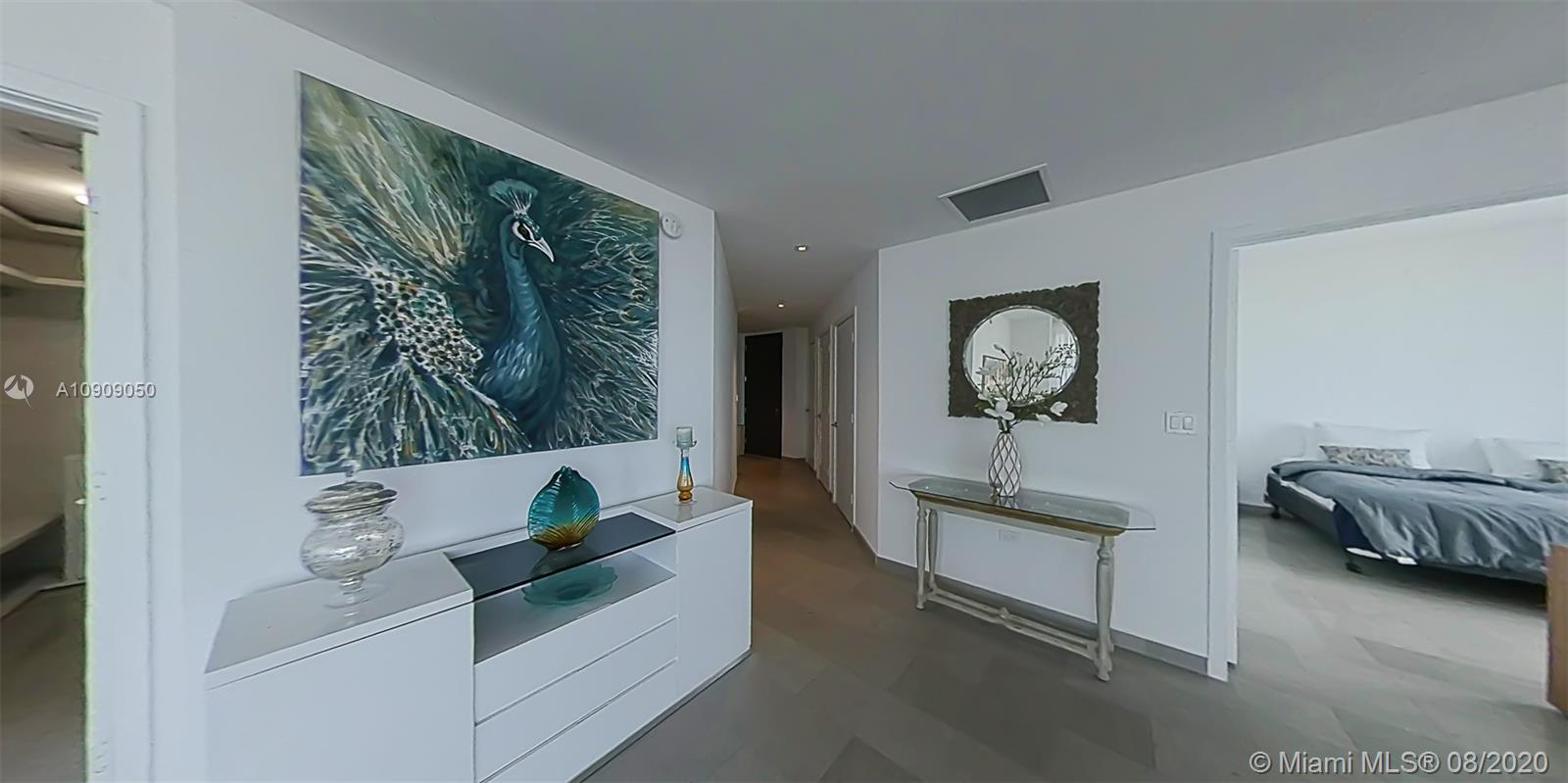 88 Southwest 7th Street, Unit 2911 Miami, FL 33130 - Photo 3 of 25 a living room with furniture and a window