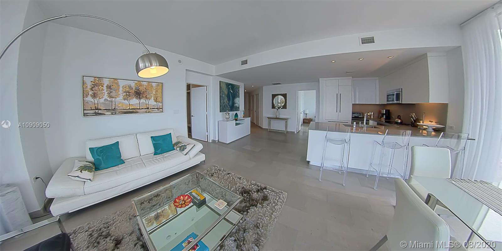 88 Southwest 7th Street, Unit 2911 Miami, FL 33130 - Photo 7 of 25 a living room with furniture and painting on the wall