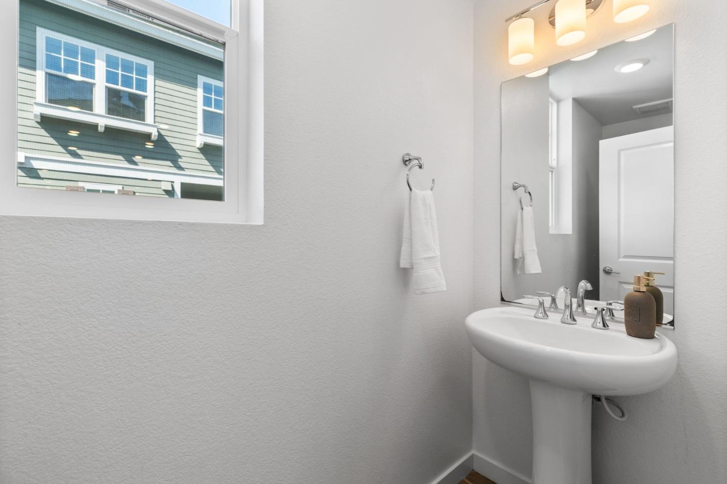 3908 Degree Lane Mountain View, CA 94043 - Photo 17 of 32 a bathroom with a sink and a mirror