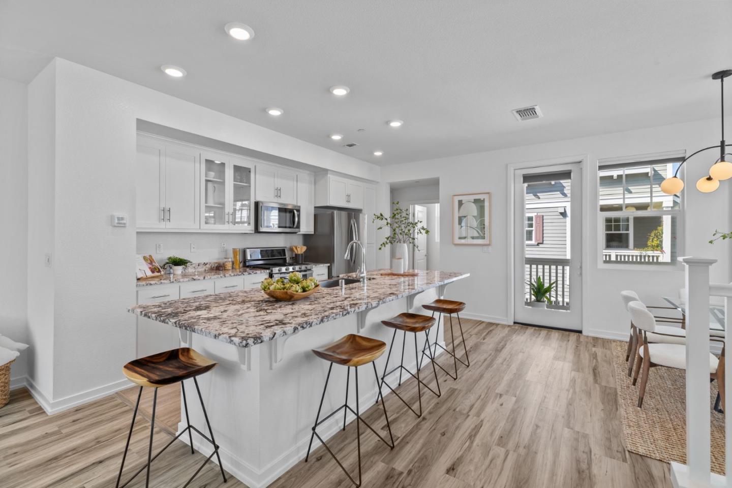 3908 Degree Lane Mountain View, CA 94043 - Photo 6 of 32 a view of a dining room with furniture and wooden floor
