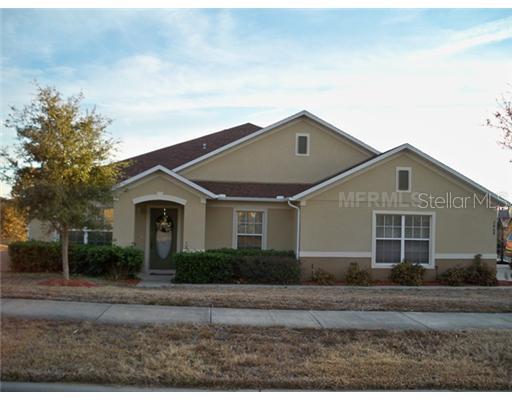 2464 Breezy Meadow Road Apopka, FL 32712 - Photo 1 of 1 a front view of a house with a yard