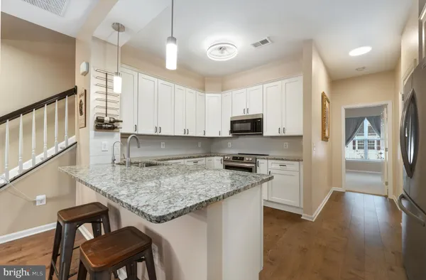 $2,631 | 13947 Hollow Wind Way, Unit 201, Woodbridge, VA 22191