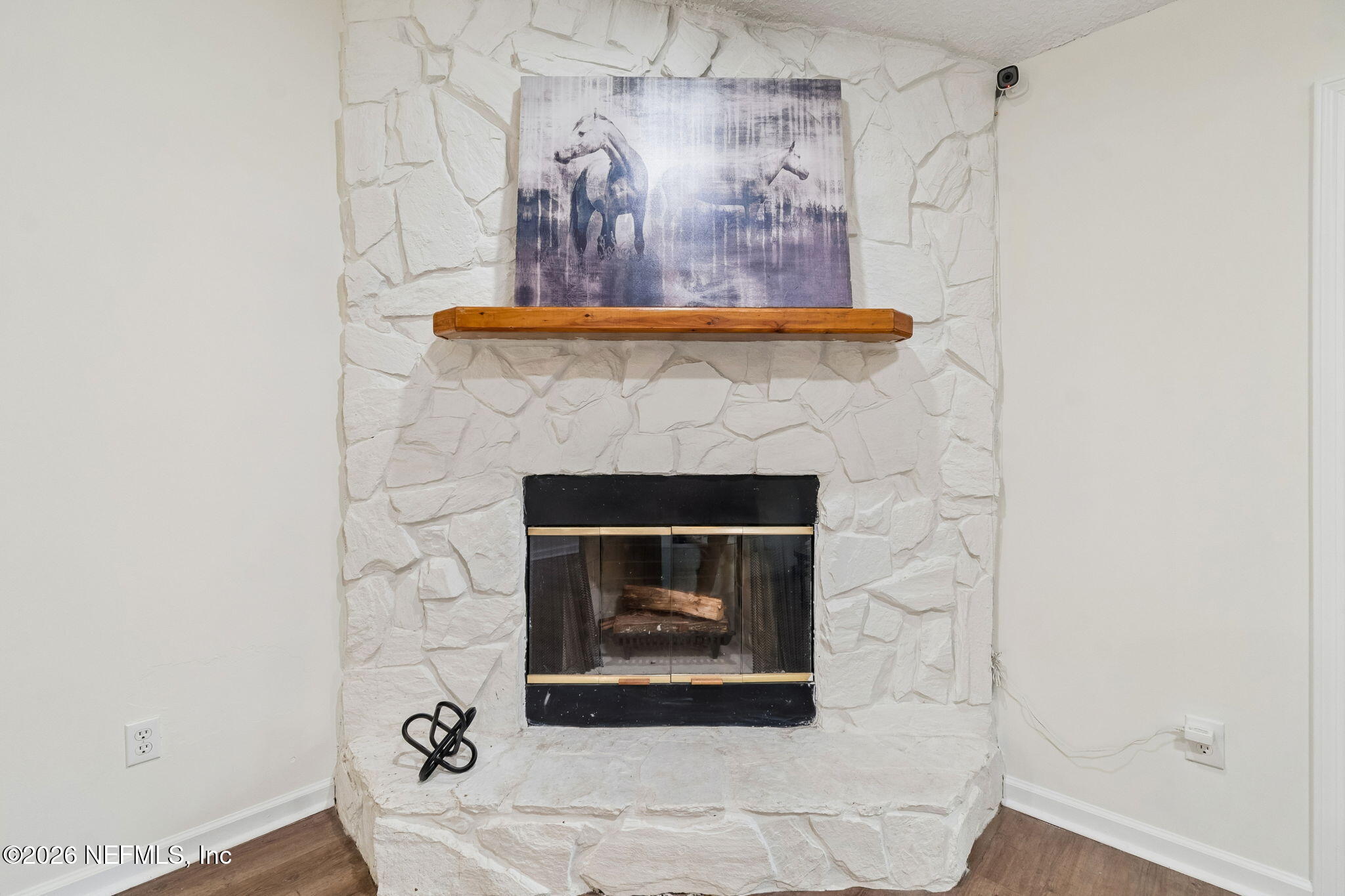 10293 Ford Road Bryceville, FL 32009 - Photo 11 of 63 a stone house with a fireplace in it