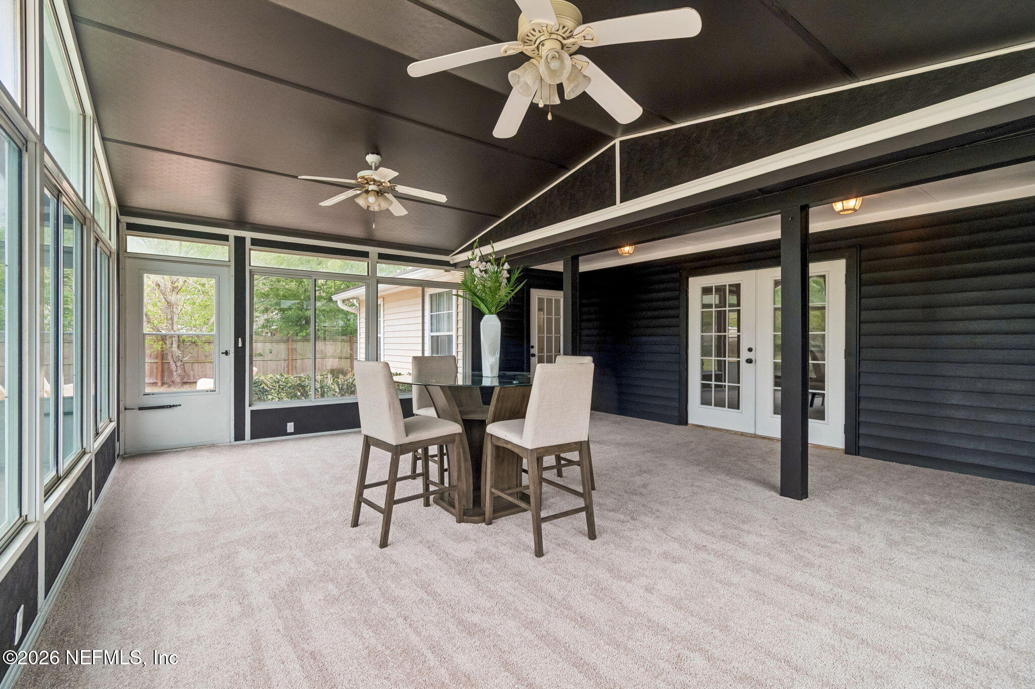 10293 Ford Road Bryceville, FL 32009 - Photo 15 of 63 a view of a dining room with furniture window and outside view