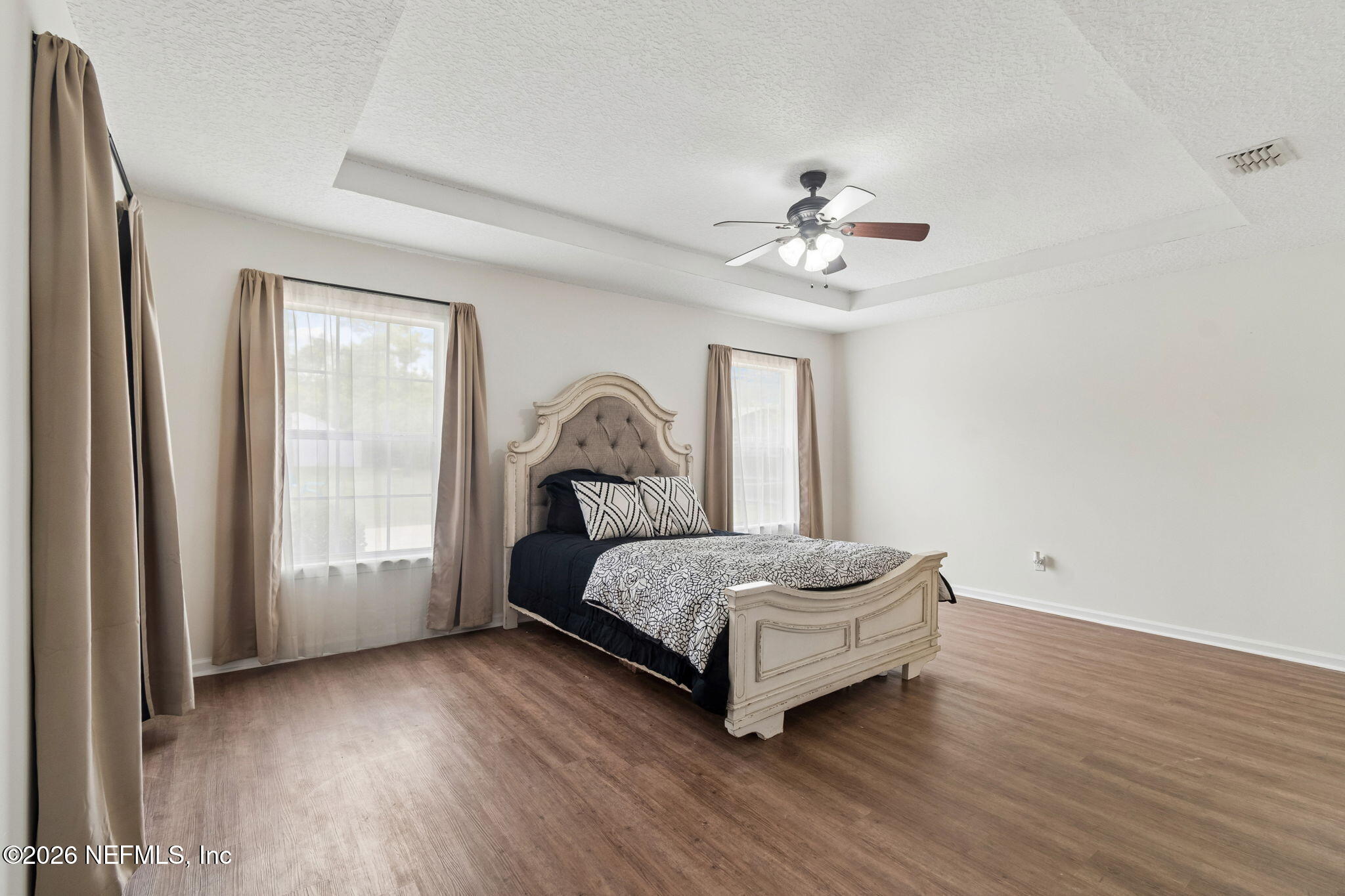 10293 Ford Road Bryceville, FL 32009 - Photo 24 of 63 a living room with a bed furniture and a window