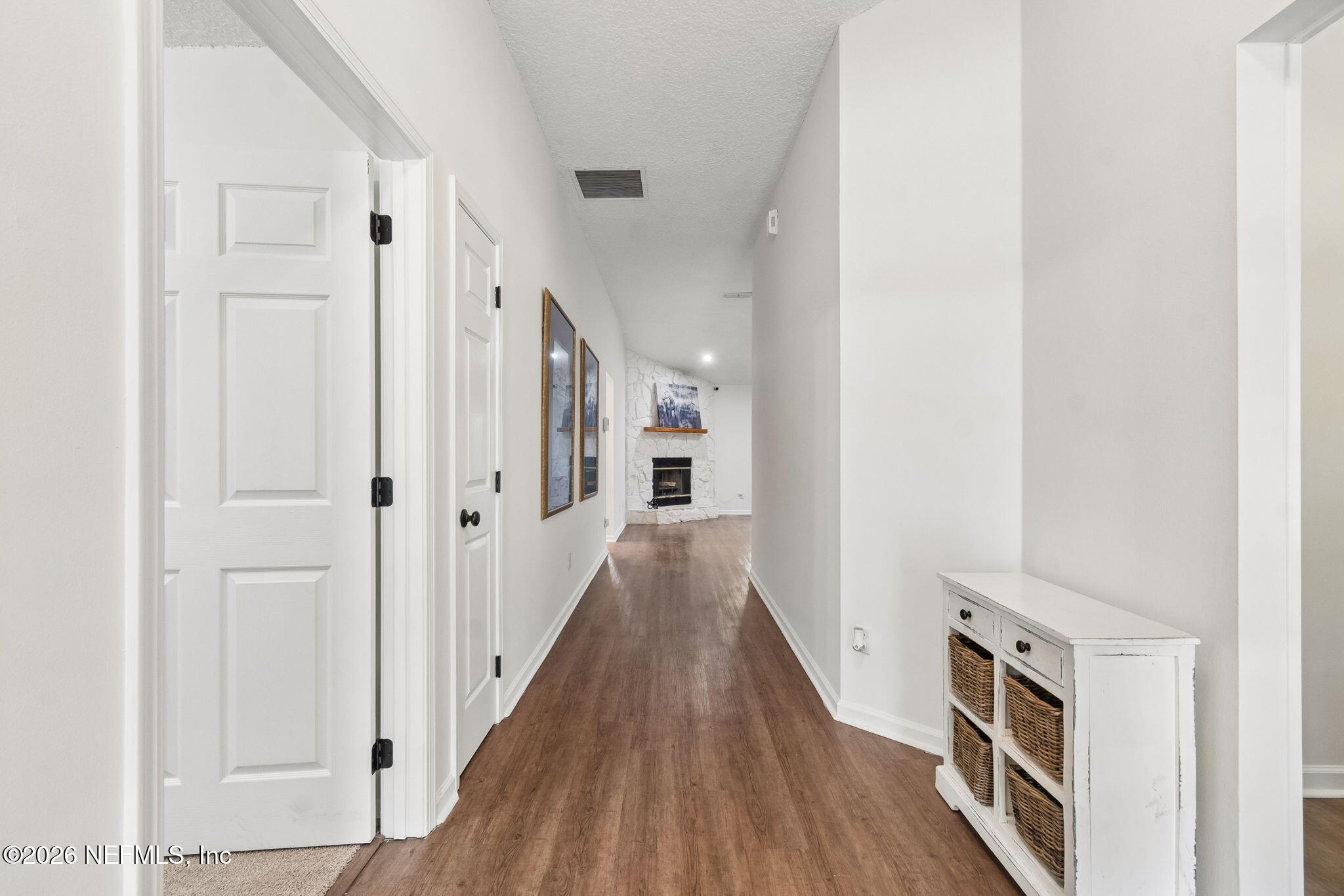 10293 Ford Road Bryceville, FL 32009 - Photo 26 of 63 a view of a hallway with wooden floor and closet