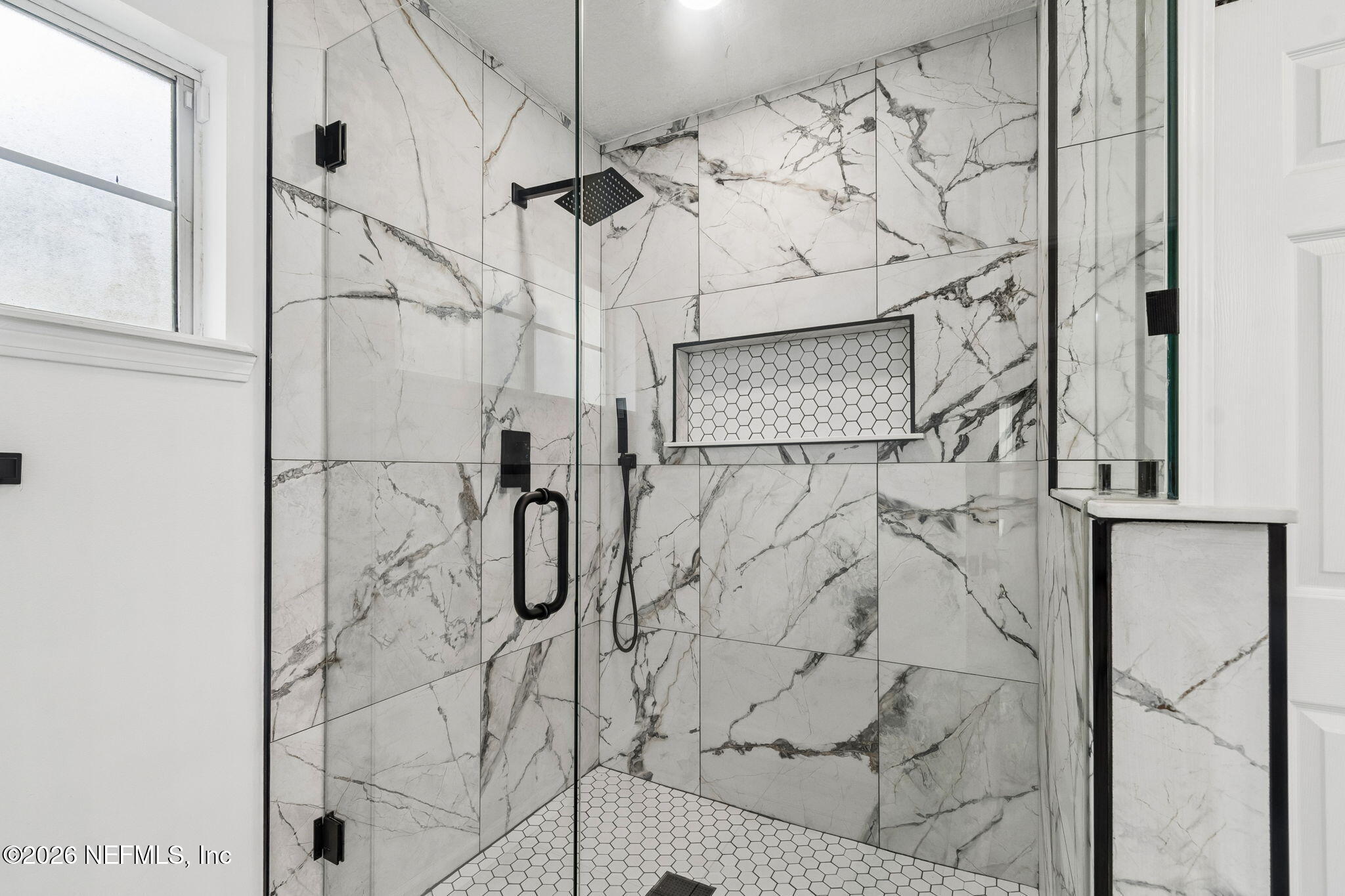 10293 Ford Road Bryceville, FL 32009 - Photo 31 of 63 a bathroom with a shower