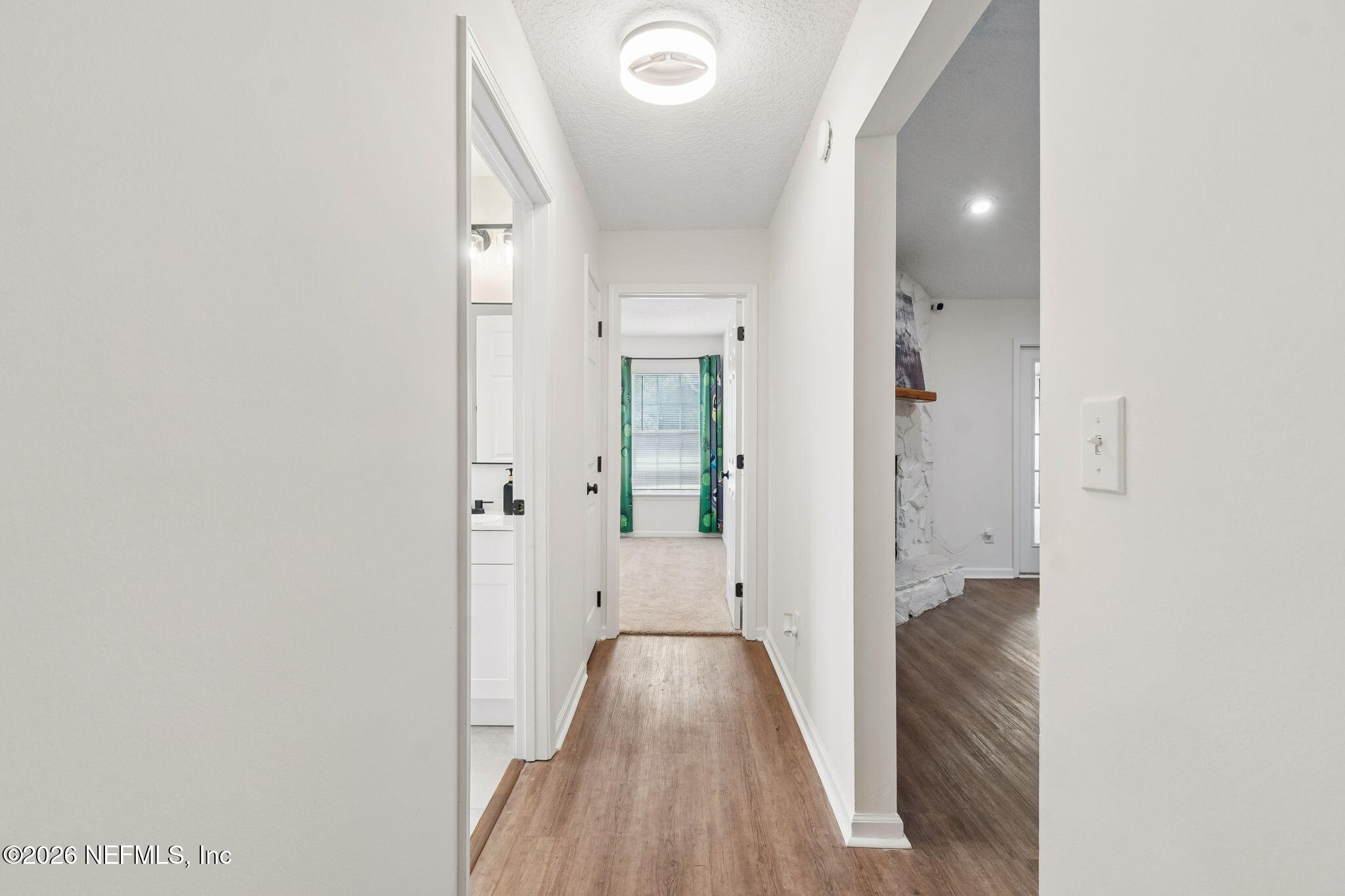 10293 Ford Road Bryceville, FL 32009 - Photo 32 of 63 wooden floor in a gallery