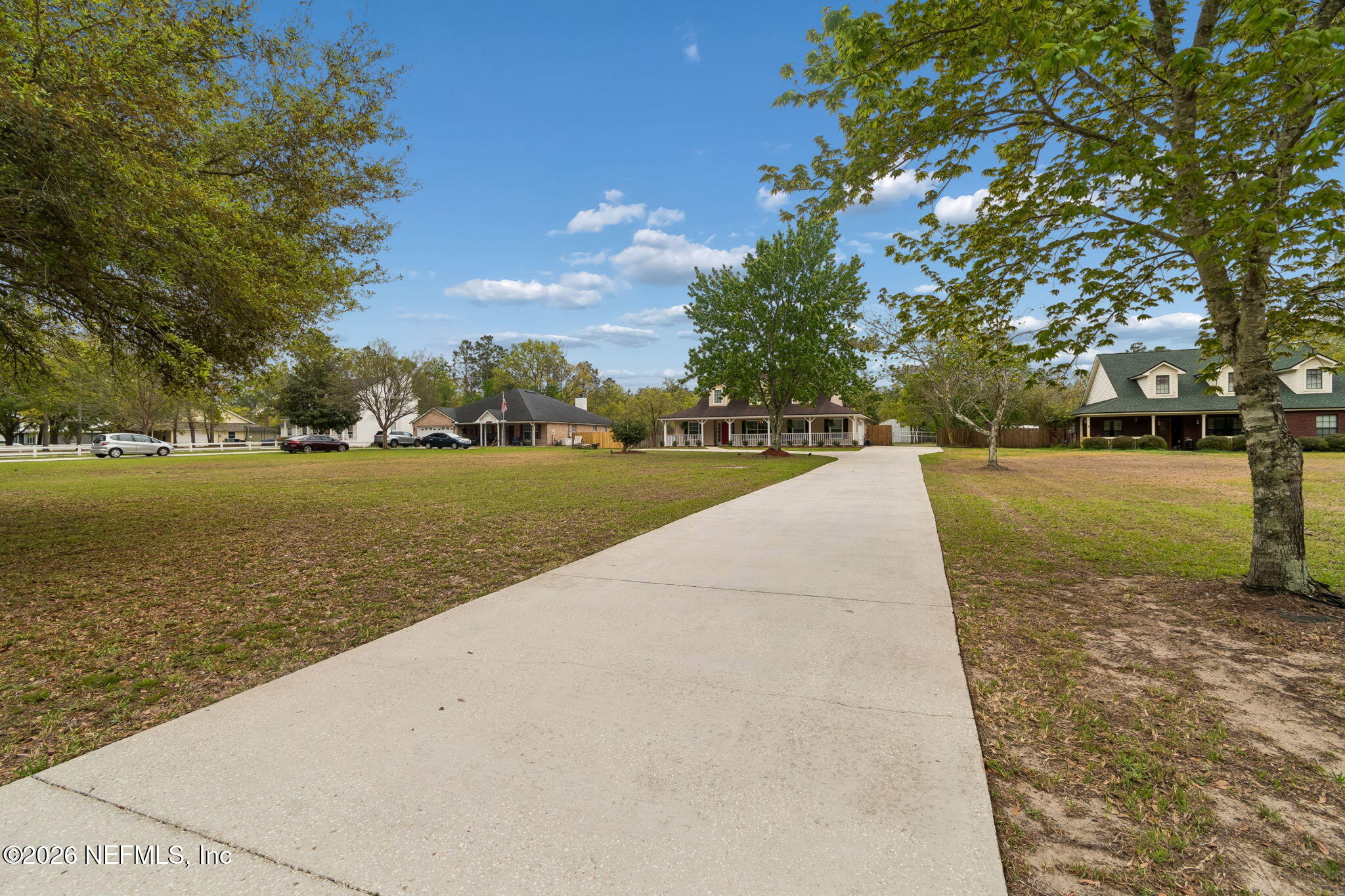 10293 Ford Road Bryceville, FL 32009 - Photo 52 of 63 a view of a yard with an ocean view